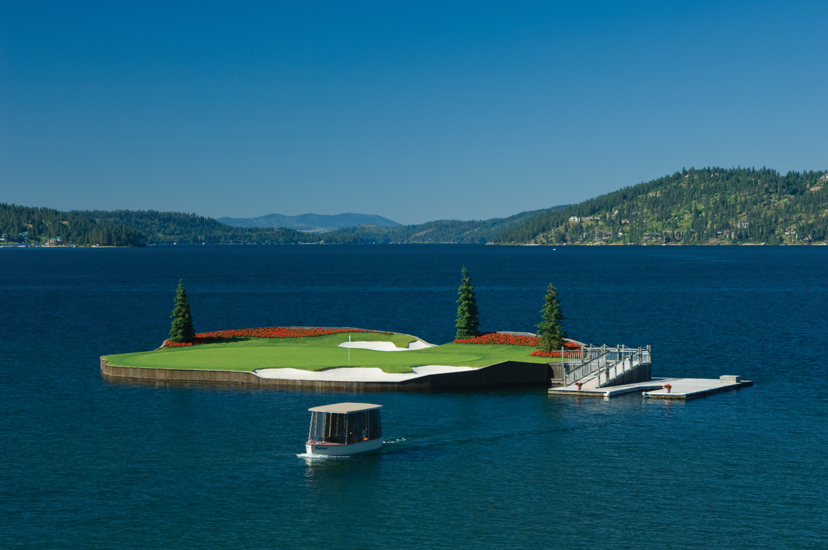 Aerial view of Lake Coeur d'Alene from above showing turquoise water and forested shores